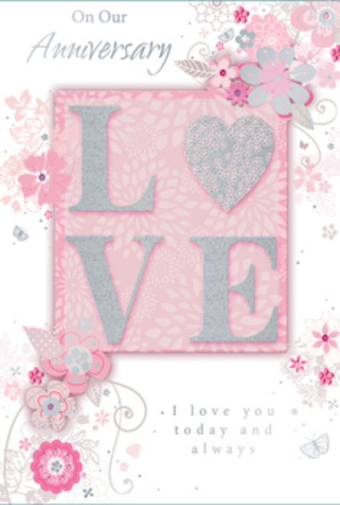 An open anniversary card fills the frame, its artwork softly illuminated as though by gentle daylight falling through a Coulsdon bay window. The primary motif, the word LOVE, is printed in raised, frosted glitter, each letter outlined with subtle shimmer that responds delicately to the light. Touching these letters would reveal a fine, grainy texture, suggesting both craftsmanship and care. Encircling this central word, wispy, hand-drawn blooms and slender sprays drift along the borders of the card. Their colours blend harmoniously in shades of tender pink, lilac-tinged ivory, and quiet grey, evoking the pastel petals of a carefully matched bouquet. Fine flourishes-looping filigree lines, dainty leaves, and tiny butterflies that almost hide among the curves-add a sense of gentle flutter, like hearts stirred by familiar vows. Below or beside the floral frame, the message I love you today and always appears in a graceful, understated typeface, inviting the reader to pause. The text is balanced so that it feels integrated into the design rather than simply placed on top, much as a Coulsdon florist arranges blooms and foliage so they feel naturally gathered. The entire card gives the impression of a hand-tied bouquet translated into paper, quietly fragrant in spirit if not in scent. It suggests an intimate moment at home-perhaps a couple sharing a quiet anniversary breakfast near one of Coulsdon's green spaces-where this card rests alongside a vase of fresh flowers delivered that morning, symbolising devotion that endures beyond the passing of years.